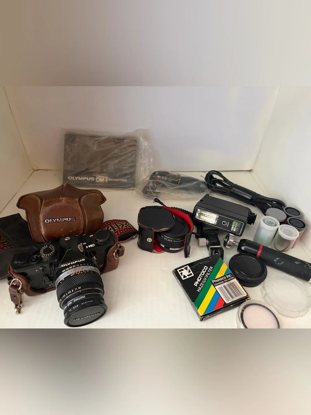 Olympus OM 1 SLR film camera with Original Leather  Case and Accessories